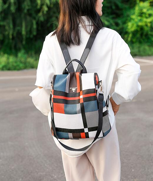 Women's Waterproof Anti-Theft Backpack - Hidden Zip Security - in use