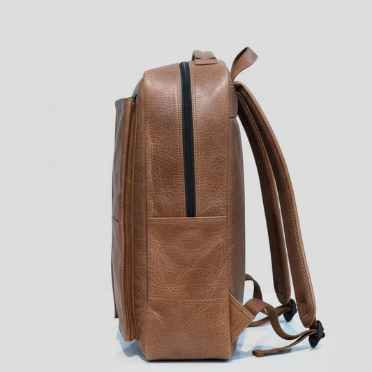 Close‑up of premium leather backpack vertical zipper detail